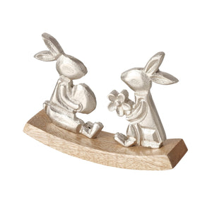 Figura decorativa con coniglietti