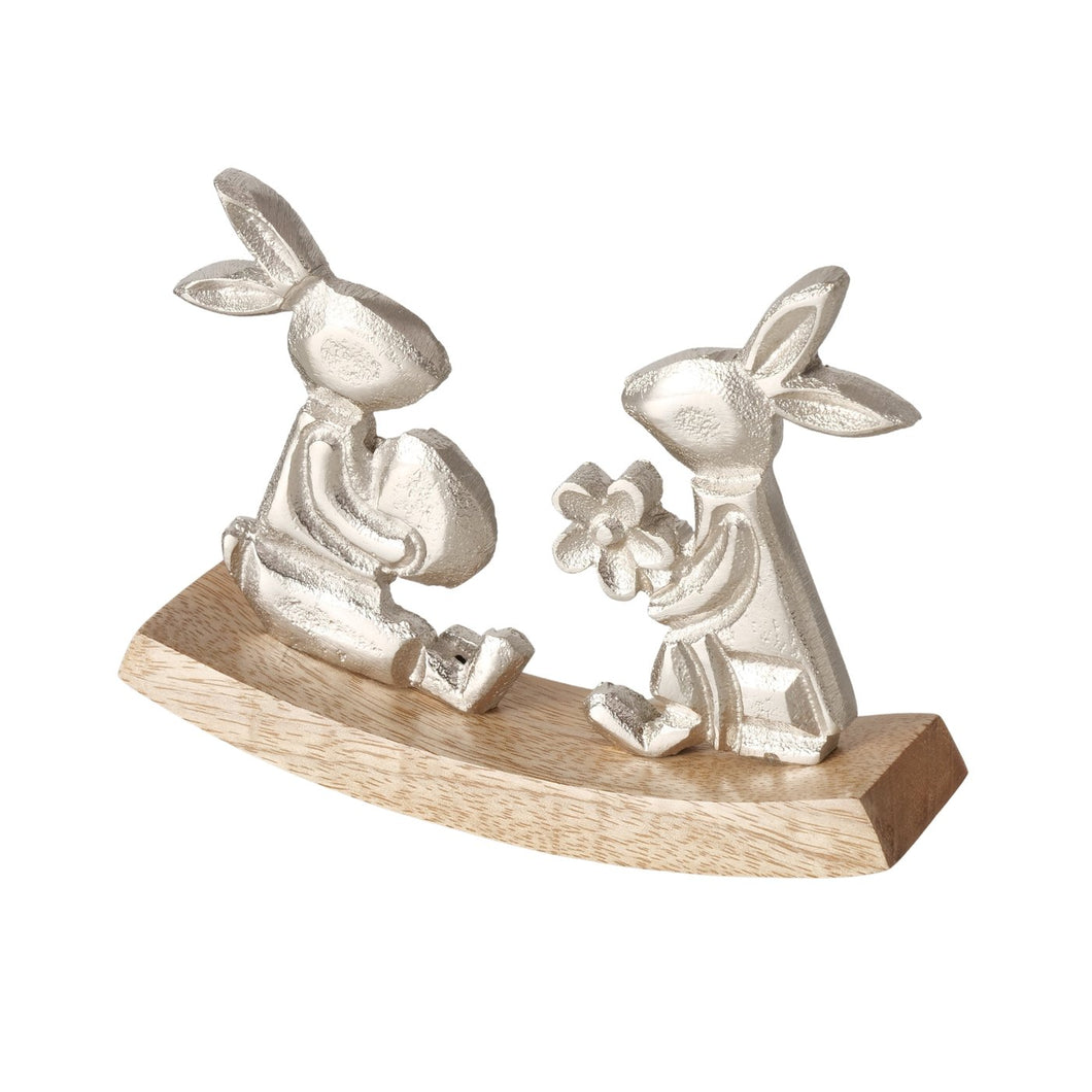 Figura decorativa con coniglietti