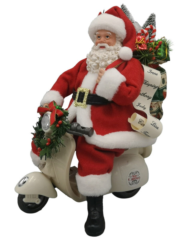 Babbo Natale in vespa con doni