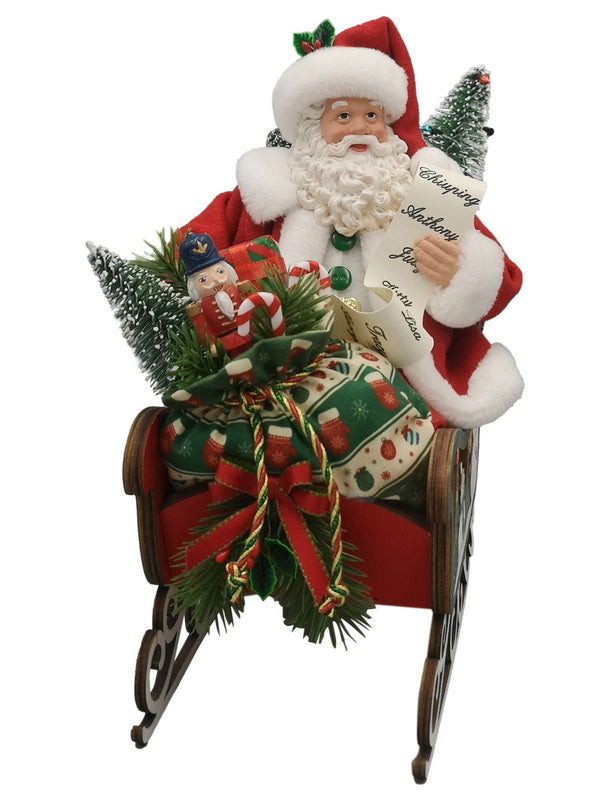 Babbo Natale in slitta con doni